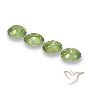 Shop natural 1.34ct ミディアムグリーン デマントイドガーネット gems, 楕円形, from ナミビア at GemSelect. In stock, global shipping!