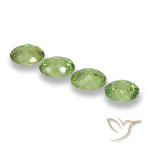 Shop natural 1.51ct イエローグリーン デマントイドガーネット gems, 楕円形, from ナミビア at GemSelect. In stock, global shipping!