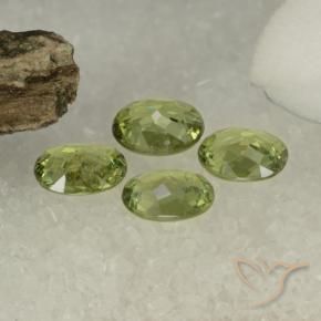 Shop natural 1.47ct オリーブグリーン デマントイドガーネット gems, 楕円形, from ナミビア at GemSelect. In stock, global shipping!