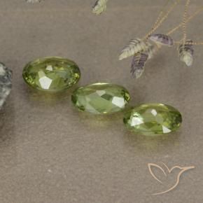 Shop natural 1.48ct オリーブグリーン デマントイドガーネット gems, 楕円形, from ナミビア at GemSelect. In stock, global shipping!