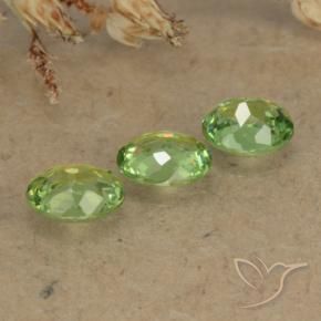 Shop natural 0.88ct ペアーグリーン デマントイドガーネット gems, 楕円形, from ナミビア at GemSelect. In stock, global shipping!