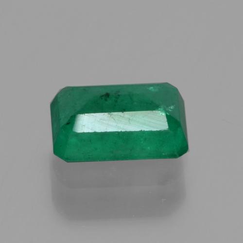 0.57カラットの天然ウォームグリーンエメラルド（6.1×4.1 mm・エメラルドカット）