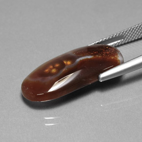 10.85カラットの天然マルチカラーファイアーアゲート（23.4×11.8 mm・透明）