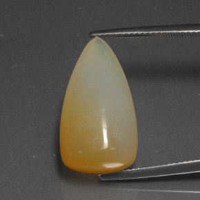 14.68カラットの天然マンダリンファイアーオパール（22.3×12.2 mm・透明）