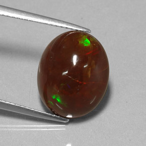 6.48カラットの天然マルチカラーファイアーオパール（14.7×12.1 mm・オーバルカット）