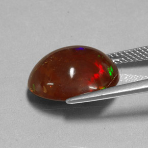 6.48カラットの天然マルチカラーファイアーオパール（14.7×12.1 mm・オーバルカット）
