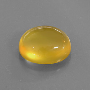 8.99カラットの天然イエローファイアーオパール（15.8×13.3 mm・透明）