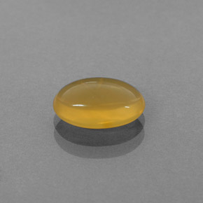 1.54カラットの天然イエローオレンジファイアーオパール（10.2×6.7 mm・透明）