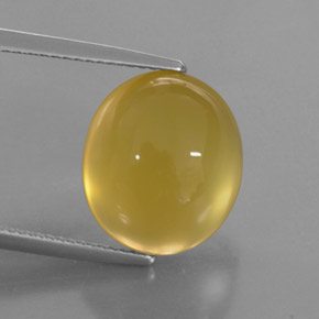9.05カラットの天然イエローファイアーオパール（14.3×12.4 mm・透明）