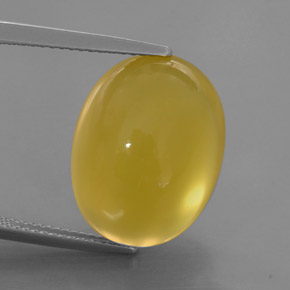 14.60カラットの天然イエローファイアーオパール（17.8×13.7 mm・透明）