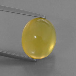 6.91カラットの天然イエローファイアーオパール（13.4×11.2 mm・透明）