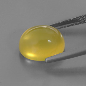 6.91カラットの天然イエローファイアーオパール（13.4×11.2 mm・透明）