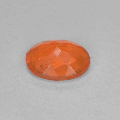 0.56カラットの天然濃いオレンジファイアーオパール（7.5×5.8 mm・オーバルカット）
