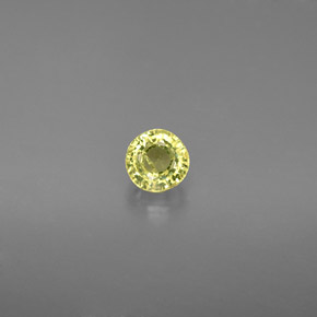 0.58カラットの天然緑がかった黄色グロッシュラーガーネット（4.56 mm・ラウンドカット）
