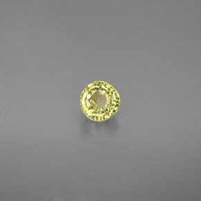 0.58カラットの天然緑がかった黄色グロッシュラーガーネット（4.56 mm・ラウンドカット）