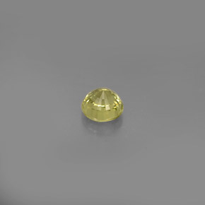 0.58カラットの天然緑がかった黄色グロッシュラーガーネット（4.56 mm・ラウンドカット）