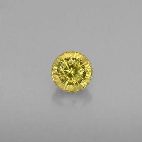 0.54カラットの天然緑がかったゴールドグロッシュラーガーネット（4.50 mm・ラウンドカット）