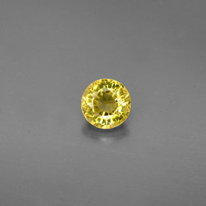0.61カラットの天然ゴールデングロッシュラーガーネット（4.96 mm・ラウンドカット）
