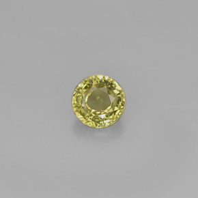 0.54カラットの天然ゴールデングリーングロッシュラーガーネット（4.61 mm・ラウンドカット）