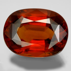 22.77カラットの天然シナモンオレンジヘソナイトガーネット（19.3×14.6 mm・オーバルカット）