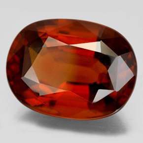 22.77カラットの天然シナモンオレンジヘソナイトガーネット（19.3×14.6 mm・オーバルカット）