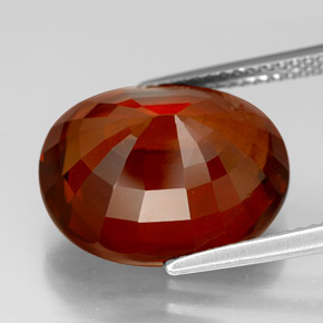 13.00カラットの天然シナモンオレンジヘソナイトガーネット（15.7×13.1 mm・オーバルカット）
