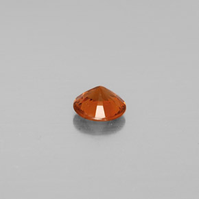 0.71カラットの天然シナモンオレンジヘソナイトガーネット（5.62 mm・ラウンドカット）