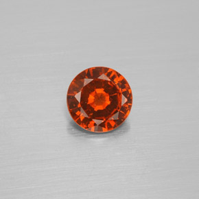 1.21カラットの天然シナモンオレンジヘソナイトガーネット（6.84 mm・ラウンドカット）