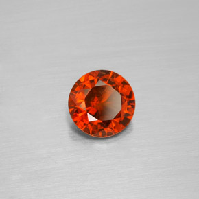 1.36カラットの天然シナモンオレンジヘソナイトガーネット（6.91 mm・ラウンドカット）