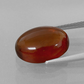 8.14カラットの天然シナモンオレンジヘソナイトガーネット、オーバルカット、透明