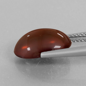 5.65カラットの天然オレンジヘソナイトガーネット、オーバルカット、半透明