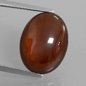 9.81カラットの天然オレンジヘソナイトガーネット（15.9×12 mm・オーバルカット）