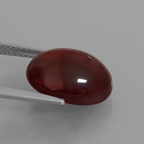 9.13カラットの天然オレンジヘソナイトガーネット、オーバルカット、半透明