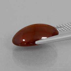 7.49カラットの天然オレンジヘソナイトガーネット、オーバルカット、半透明