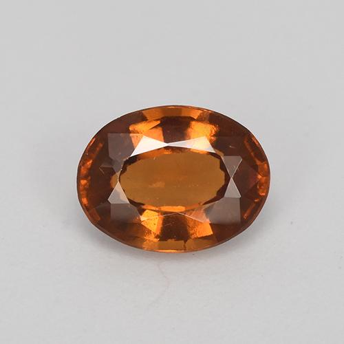 1.27カラットの天然ディープオレンジヘソナイトガーネット（7.8×6 mm・オーバルカット）