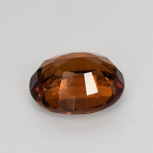 1.54カラットの天然ミディアムダークオレンジヘソナイトガーネット（7.7×6.3 mm・オーバルカット）