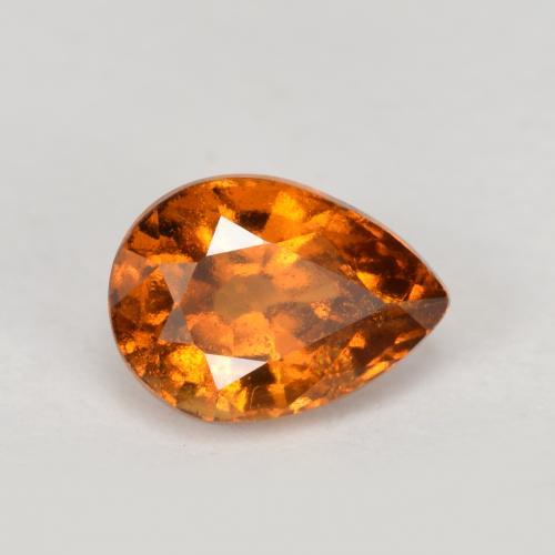 0.90カラットの天然ミディアムダークオレンジヘソナイトガーネット（6.6×4.8 mm・洋梨の形）