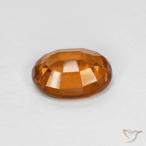 1.21カラットの天然Medium Dark-Orangeヘソナイトガーネット、楕円形、VS