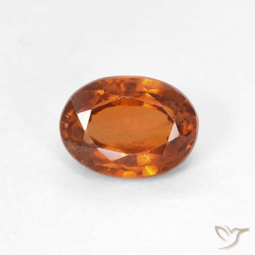 0.83カラットの天然Medium Dark-Orangeヘソナイトガーネット、楕円形、VS