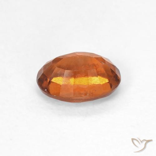 0.83カラットの天然Medium Dark-Orangeヘソナイトガーネット、楕円形、VS