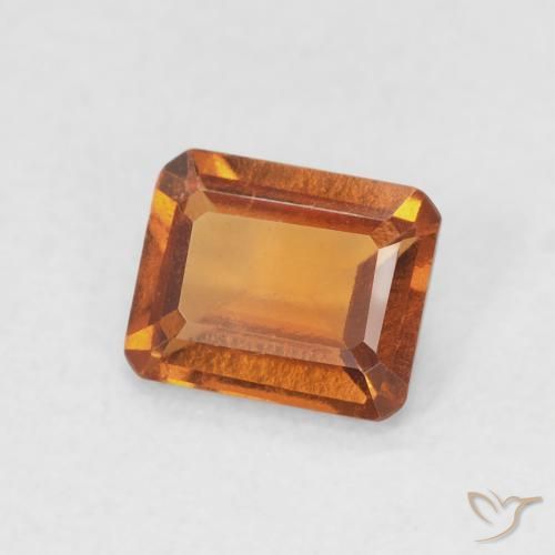 0.82カラットの天然Medium Dark-Orangeヘソナイトガーネット、八角形 / エメラルドカット、VVS-VS