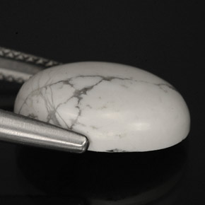 5.82カラットの天然灰色がかった白ハウライト、オーバルカット、オペーク