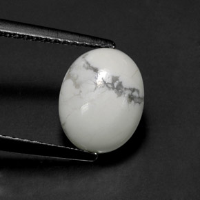 2.55カラットの天然灰色がかった白ハウライト（10×8 mm・オーバルカット）