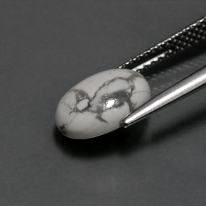 2.48カラットの天然灰色がかった白ハウライト、オーバルカット、オペーク