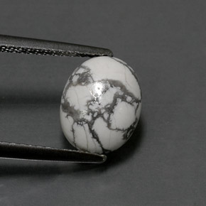 2.36カラットの天然灰色がかった白ハウライト、オーバルカット、オペーク