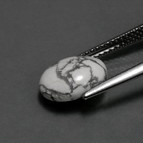 2.36カラットの天然灰色がかった白ハウライト、オーバルカット、オペーク