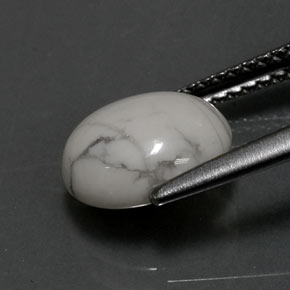 2.36カラットの天然灰色がかった白ハウライト、オーバルカット、オペーク