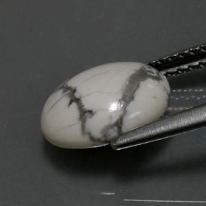 2.48カラットの天然灰色がかった白ハウライト、オーバルカット、オペーク