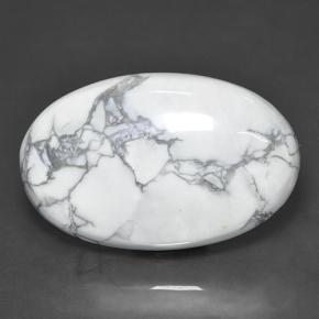 63.57カラットの天然灰色がかった白ハウライト（39.1×24.8 mm・オーバルカット）