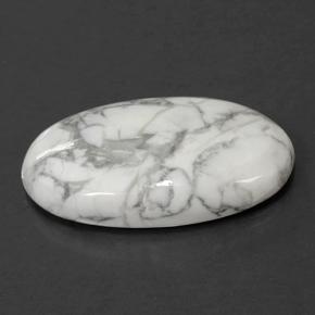 58.22カラットの天然灰色がかった白ハウライト（37×23.4 mm・オーバルカット）